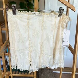 Urban outfitters Lola lace spliced mini skirt